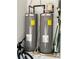 Energy-efficient water heaters with visible Rheem brand, installed with modern plumbing at 814 Lakehaven Ln, Loganville, GA 30052