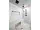 Modern bathroom featuring a glass shower with dual showerheads and a built-in seat at 8175 Main St, Woodstock, GA 30188