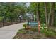 Greenprints Noonday Creek Trail entrance with manicured landscaping, providing a scenic walking experience at 8175 Main St, Woodstock, GA 30188