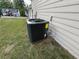 Air conditioning unit on the side of the home and backyard at 9454 Lakeview Ct, Douglasville, GA 30135