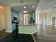 Open-concept living space with kitchen, dining, and living areas, perfect for entertaining guests at 9454 Lakeview Ct, Douglasville, GA 30135