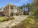 Large backyard featuring an in-law suite and additional covered parking at 105 Laurel Ridge Ct, Fayetteville, GA 30215