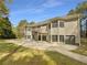 Spacious backyard with a patio, perfect for entertaining and relaxation at 105 Laurel Ridge Ct, Fayetteville, GA 30215