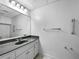 Simple bathroom featuring a vanity with a mirror and a towel bar for convenience at 105 Laurel Ridge Ct, Fayetteville, GA 30215