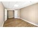 Comfortable bedroom with hardwood floors, neutral walls, and closet for convenience at 105 Laurel Ridge Ct, Fayetteville, GA 30215
