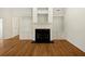 Spacious living room with hardwood floors and fireplace feature wall at 105 Laurel Ridge Ct, Fayetteville, GA 30215