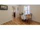Cozy dining area with natural light and classic wood furniture at 1325 East Forrest Ave, East Point, GA 30344
