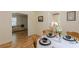 Charming dining room offering a view into the kitchen and a comfortable living space at 1325 East Forrest Ave, East Point, GA 30344