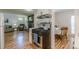 Charming kitchen with stainless appliances adjoining the living area and breakfast nook at 1325 East Forrest Ave, East Point, GA 30344