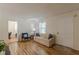 Comfortable living room with hardwood floors, stylish decor, and natural light at 1325 East Forrest Ave, East Point, GA 30344