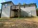 Backyard with small lawn and wood deck at 185 Glenrose Sw Cir, Atlanta, GA 30354