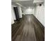 A bright and spacious basement area with wood-look flooring, perfect for customization at 185 Glenrose Sw Cir, Atlanta, GA 30354