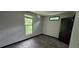 This bedroom offers neutral walls, carpet flooring and a window for natural light at 185 Glenrose Sw Cir, Atlanta, GA 30354