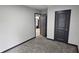This bedroom boasts neutral walls, carpet flooring, and easy access to other rooms at 185 Glenrose Sw Cir, Atlanta, GA 30354