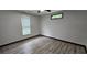 Cozy bedroom with wood-look flooring and a ceiling fan at 185 Glenrose Sw Cir, Atlanta, GA 30354