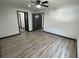 Large bedroom with wood-look floors and ample closet space at 185 Glenrose Sw Cir, Atlanta, GA 30354