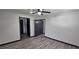 Spacious bedroom with wood-look flooring and multiple closets at 185 Glenrose Sw Cir, Atlanta, GA 30354