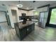 Modern kitchen with stainless steel appliances, granite countertops, and updated lighting at 185 Glenrose Sw Cir, Atlanta, GA 30354