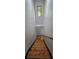 Stairwell with wooden stairs and natural light at 185 Glenrose Sw Cir, Atlanta, GA 30354