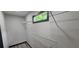 Bright walk-in closet featuring white wire shelving and a small window at 185 Glenrose Sw Cir, Atlanta, GA 30354
