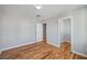 Bedroom features hardwood floors, a flush mount light, closet and doorways at 3180 Tackett Rd, Douglasville, GA 30135