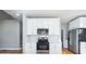 Modern kitchen featuring stainless appliances and granite countertops at 3180 Tackett Rd, Douglasville, GA 30135