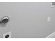 Grey laundry room features a vent hookup for a dryer, and a hookup for a washer at 3180 Tackett Rd, Douglasville, GA 30135