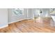 Open living space with hardwood floors, flowing into other rooms at 3180 Tackett Rd, Douglasville, GA 30135