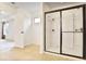 Bathroom featuring a glass-enclosed shower with built-in shelving, perfect for a modern design at 3570 Terrasol Sw Trl, Lilburn, GA 30047