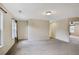 A large bonus room features a window and adjoins another room at 3570 Terrasol Sw Trl, Lilburn, GA 30047