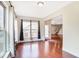 Cozy breakfast nook featuring a walk out deck and hardwood floors at 3570 Terrasol Sw Trl, Lilburn, GA 30047