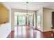 Bright breakfast nook features large windows offering natural light and deck access at 3570 Terrasol Sw Trl, Lilburn, GA 30047