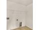 Simple laundry room with tiled floor and appliance hookups at 3570 Terrasol Sw Trl, Lilburn, GA 30047