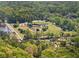 Scenic aerial view showcasing local sports complex with baseball and soccer fields, surrounded by trees and greenery at 1395 Oconee Ne Pass, Brookhaven, GA 30319