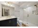 Modern bathroom featuring a walk-in shower with glass door, and sleek vanity at 1395 Oconee Ne Pass, Brookhaven, GA 30319