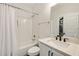 Clean bathroom with subway-tiled shower, modern fixtures and granite countertop at 1395 Oconee Ne Pass, Brookhaven, GA 30319