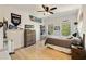 Well-lit bedroom with a large bed, dresser, and decor celebrating championship sports teams at 1395 Oconee Ne Pass, Brookhaven, GA 30319