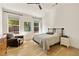 Inviting bedroom with ample natural light and warm wood floors, creating a cozy atmosphere at 1395 Oconee Ne Pass, Brookhaven, GA 30319