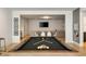 Spacious game room with pool table and an open floor plan leading to a cozy seating area at 1395 Oconee Ne Pass, Brookhaven, GA 30319