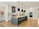 Spacious kitchen features an island with seating, stainless steel appliances, and modern finishes at 1395 Oconee Ne Pass, Brookhaven, GA 30319