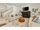 Inviting living room featuring a fireplace, hardwood floors, and comfortable seating with stairs and second story views at 1395 Oconee Ne Pass, Brookhaven, GA 30319