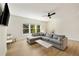 Comfortable living room with a large sectional sofa and plenty of natural light at 1395 Oconee Ne Pass, Brookhaven, GA 30319