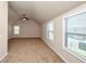 Spacious carpeted bedroom with vaulted ceiling and natural light at 2375 Walker Dr, Hampton, GA 30228