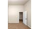 Neutral bedroom featuring an open door leading into the hallway at 2375 Walker Dr, Hampton, GA 30228