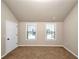 Neutral bedroom featuring large windows providing ample natural light at 2375 Walker Dr, Hampton, GA 30228