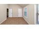 Spacious bedroom with neutral paint and large windows at 2375 Walker Dr, Hampton, GA 30228