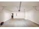 Spacious garage with concrete floors and shelving at 2375 Walker Dr, Hampton, GA 30228