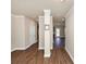 Spacious hallway with beautiful wood flooring and neutral wall tones at 2375 Walker Dr, Hampton, GA 30228