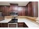 Lovely kitchen with stainless steel appliances and plenty of counter space at 2375 Walker Dr, Hampton, GA 30228
