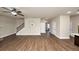 Open living room layout with beautiful floors and natural lighting from windows at 2375 Walker Dr, Hampton, GA 30228